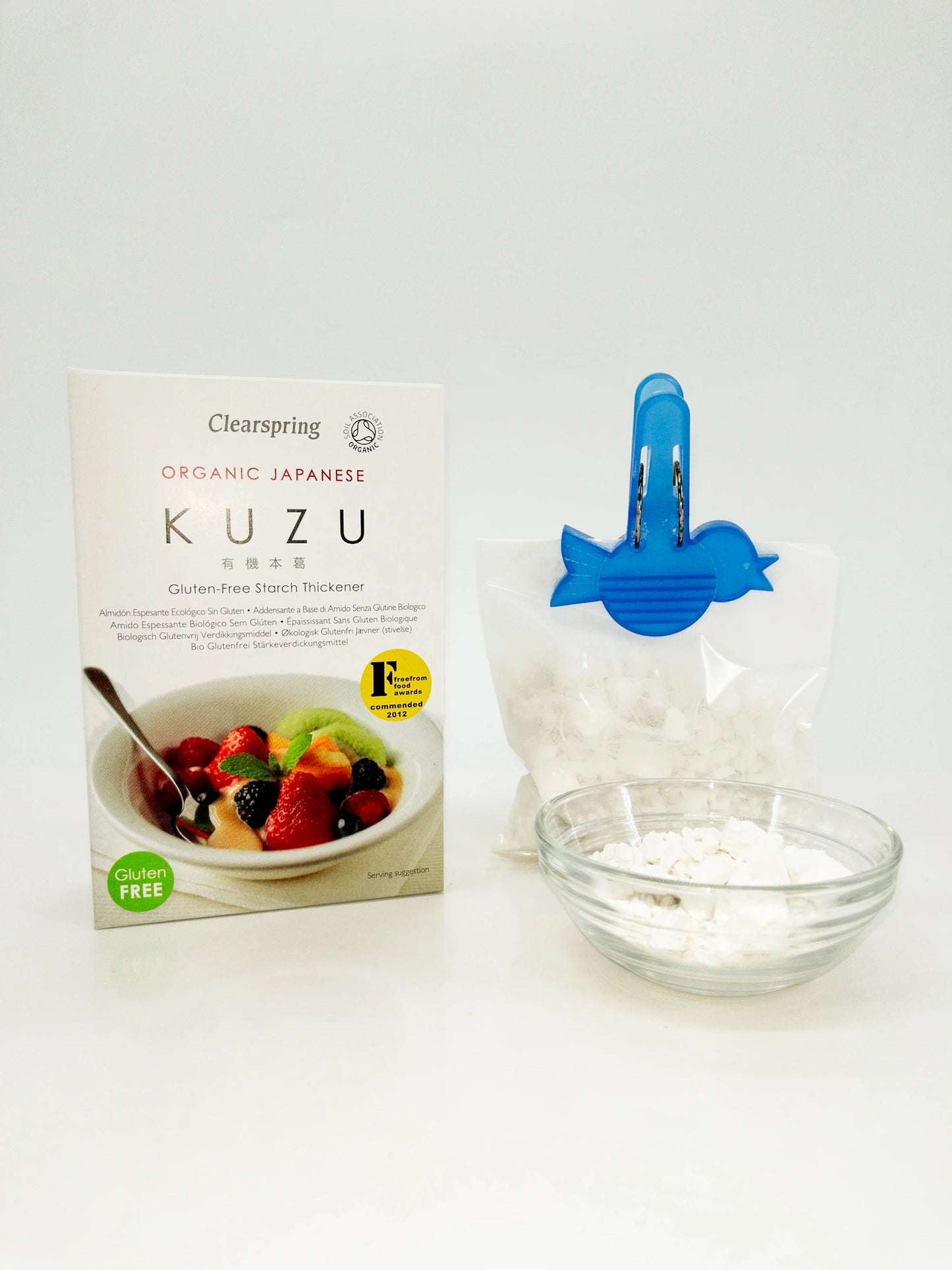 Boîte de Kuzu Blanc Japonais Bio de Clearspring, accompagné de son sachet et d'une coupelle remplie de Kuzu | Eat in Japan Épicerie en ligne